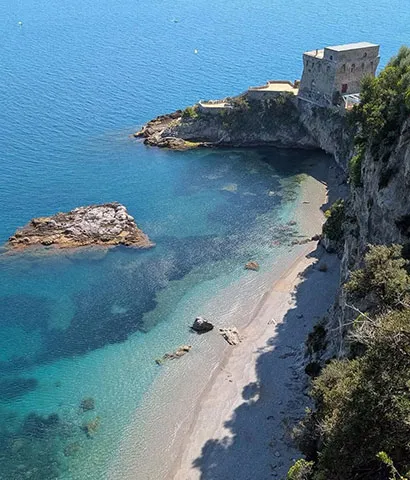 Exclusive chauffeur service to the hidden beach and crystal waters of Erchie.